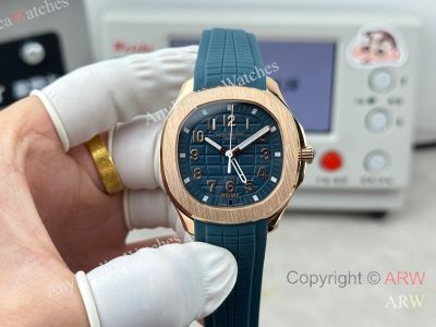 High Quality Replica PATEK PHILIPPE Aquanaut Luce Dark Blue Integrated Composite Strap Dark Blue Embossed Pattern Face Dial 48 Diamonds Inlaid Round Octagonal Case Watch 38mm